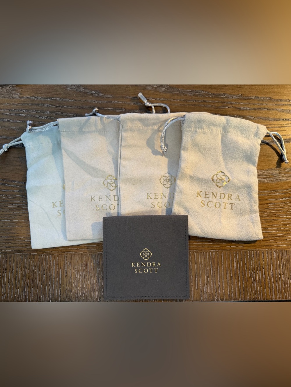 Kendra Scott Cream Drawstring Pouches with Gray Presentation Pouch